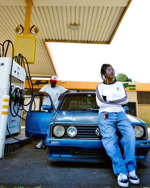 Original reference photo of the blue car scene